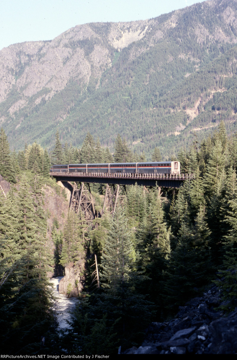 Empire Builder crosses Nason Creek in the late afternoon